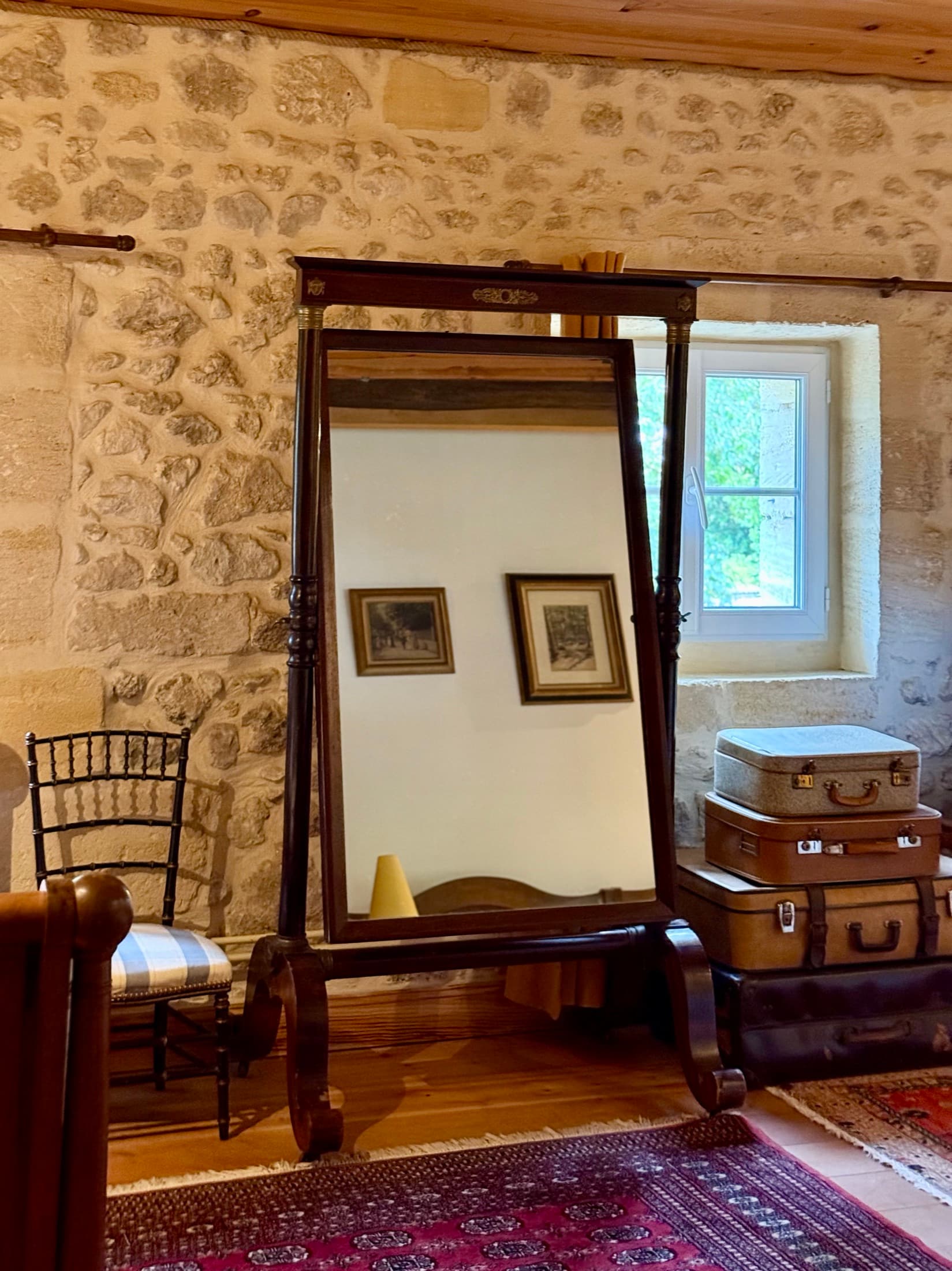 Mirror and furniture in the Charles Hayes room