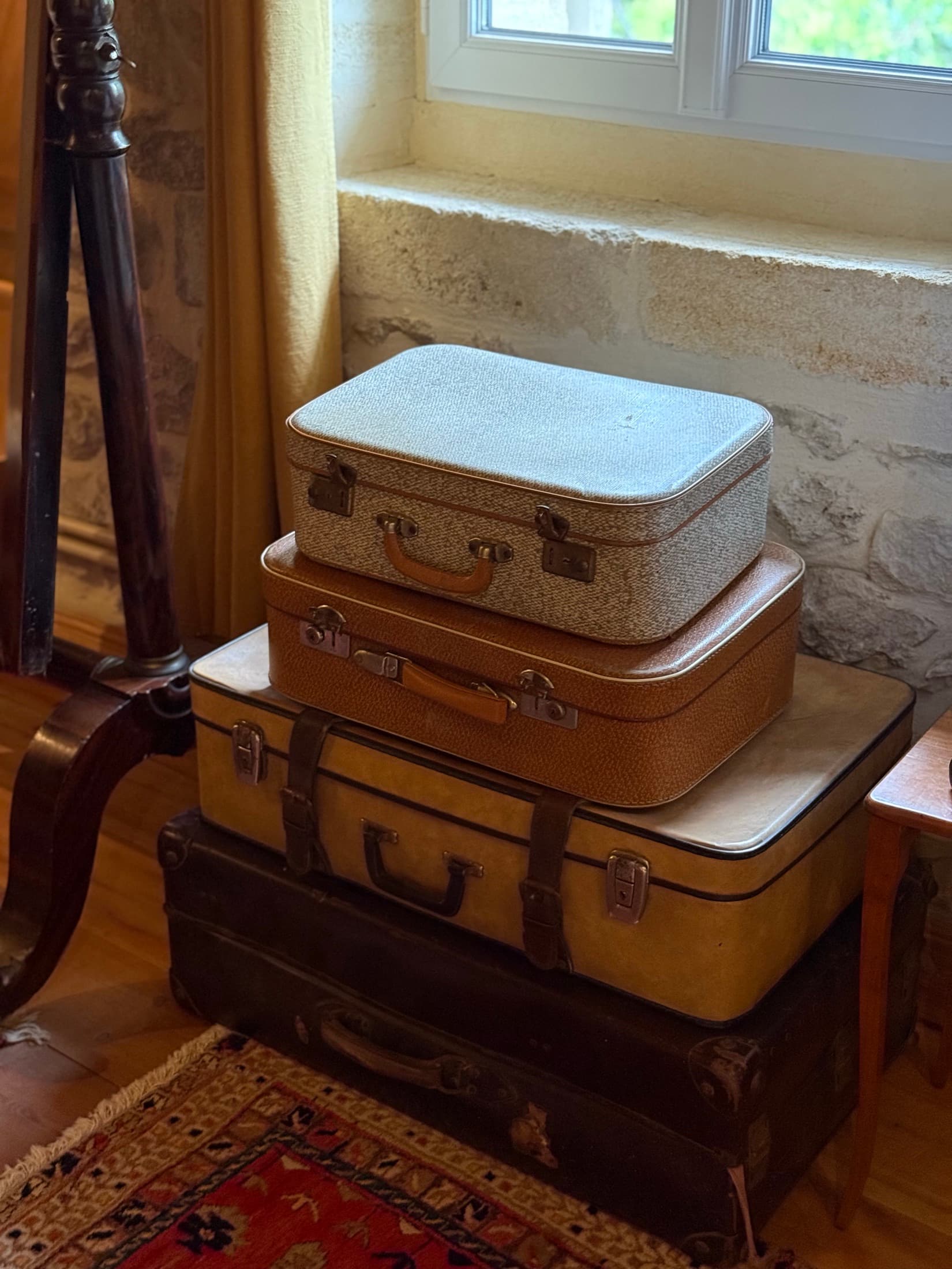 Vintage luggage detail in the Charles Hayes room